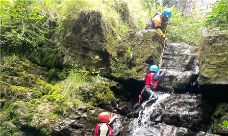 rushing down a waterfall